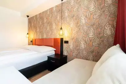 2_hotel-enziana-wien-zimmer-superior-bett.webp